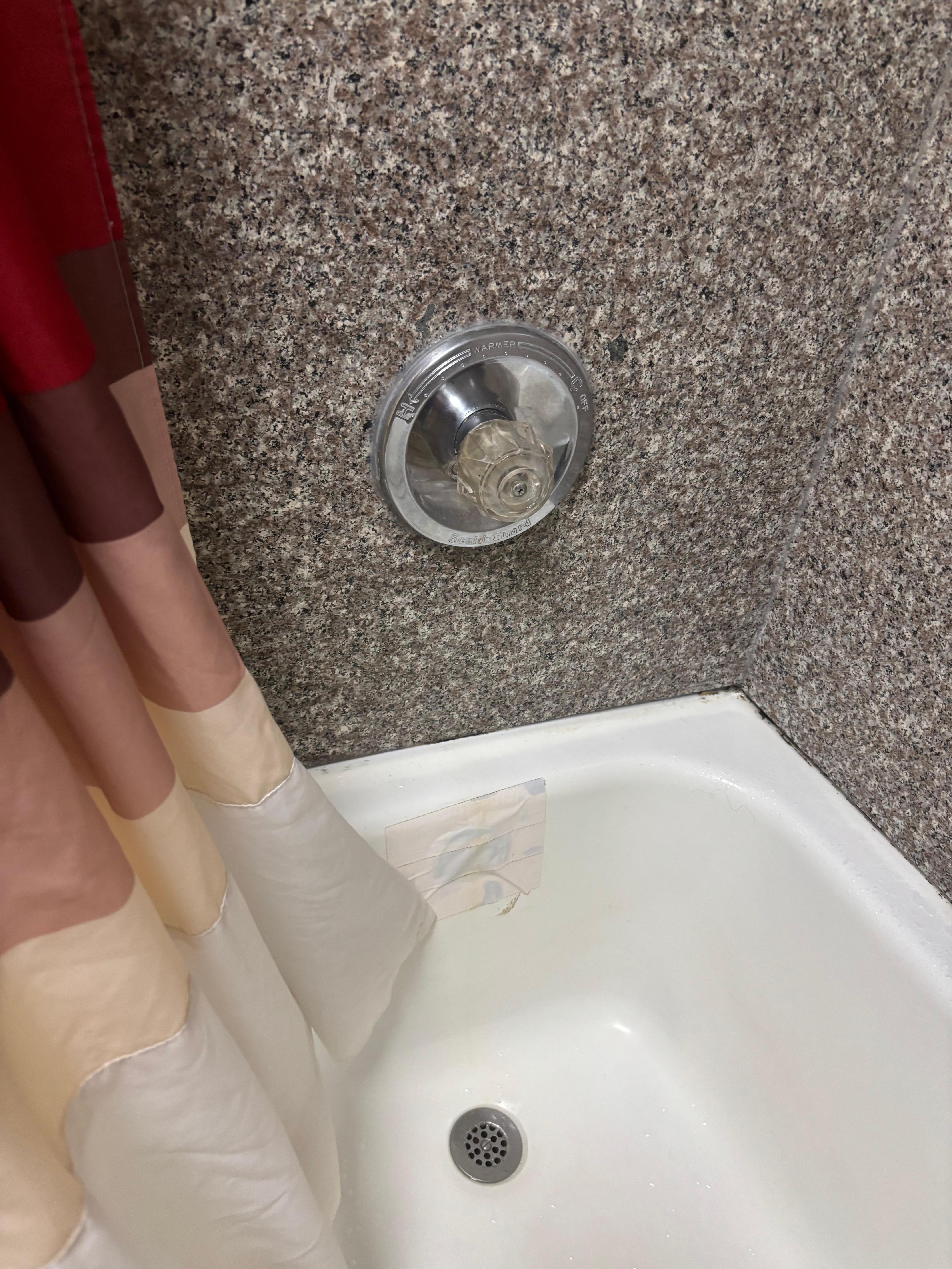 Masking tape over the tub port. No bath for us. 