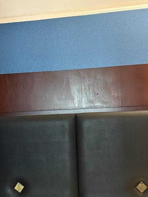 headboard nasty like someone spilled something all down it 