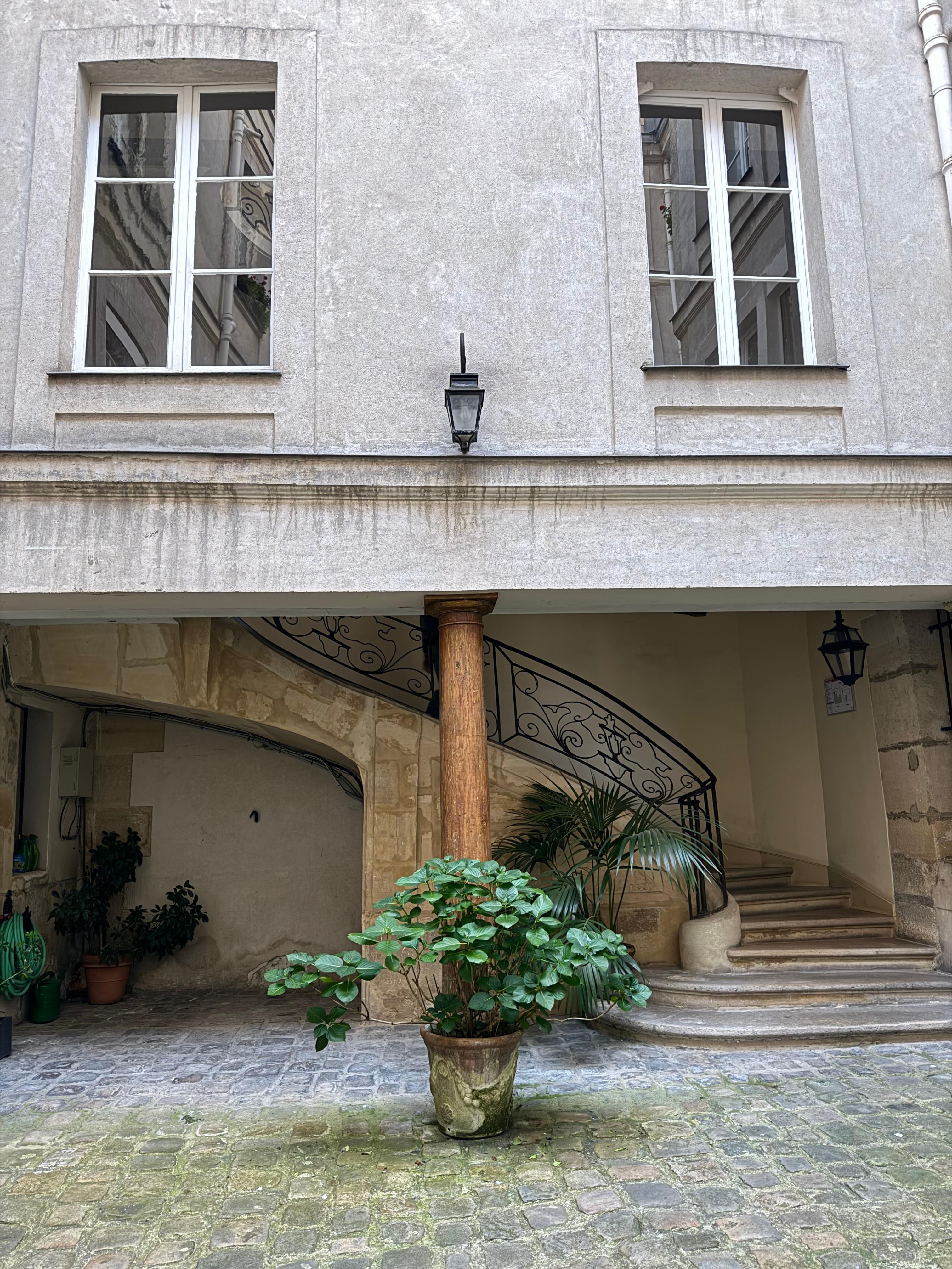 Courtyard and stairs to the apartment