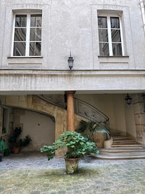 Courtyard and stairs to the apartment