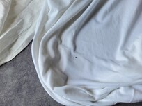 Hole in linen