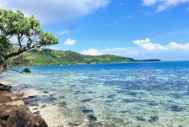 This is a view across the water hotel in background