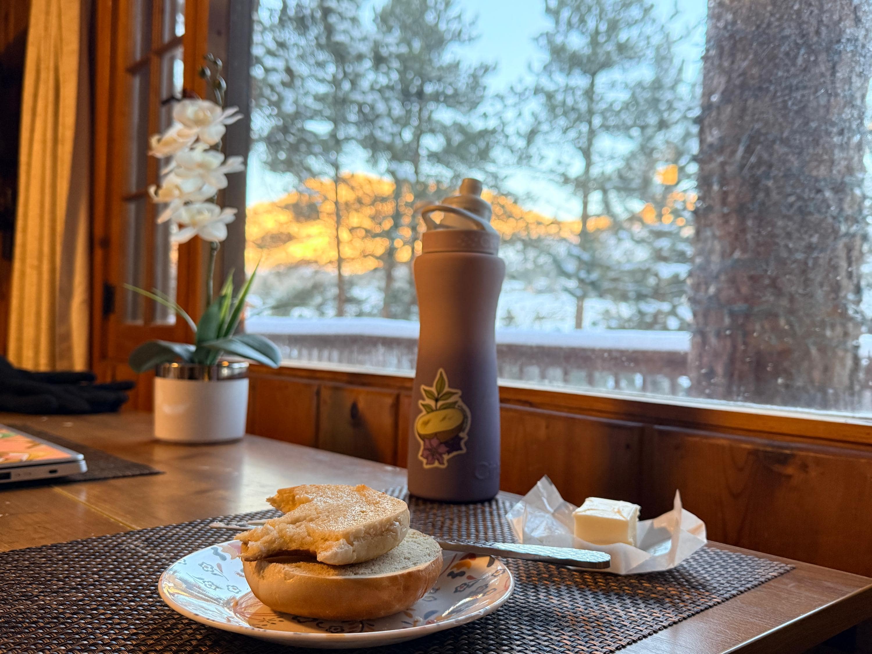 Breakfast at sunrise on a snowy mountain