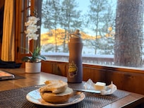 Breakfast at sunrise on a snowy mountain