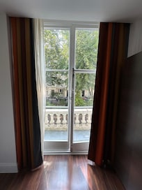 Balcony- you can’t go out but can crack window open