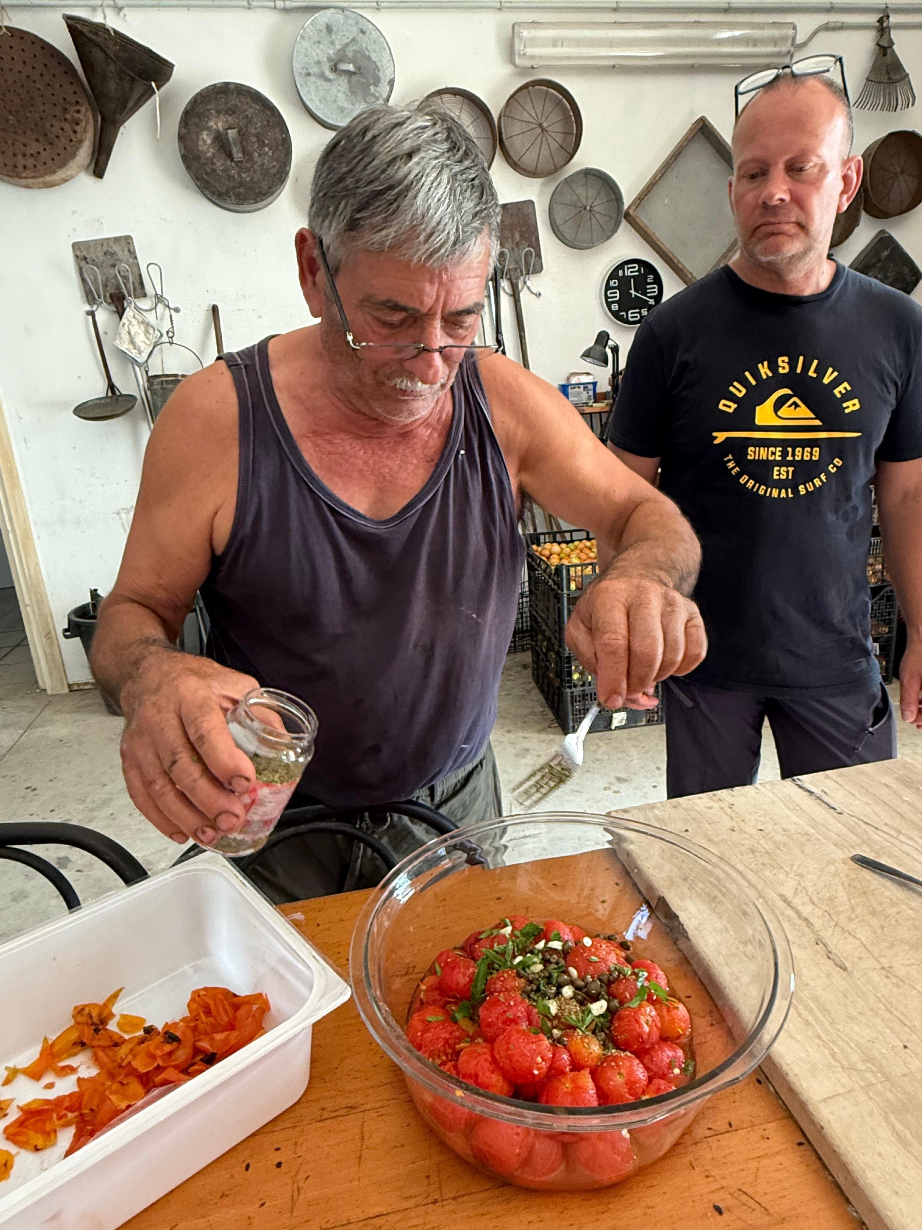 Oronzino showing us local food specialities 