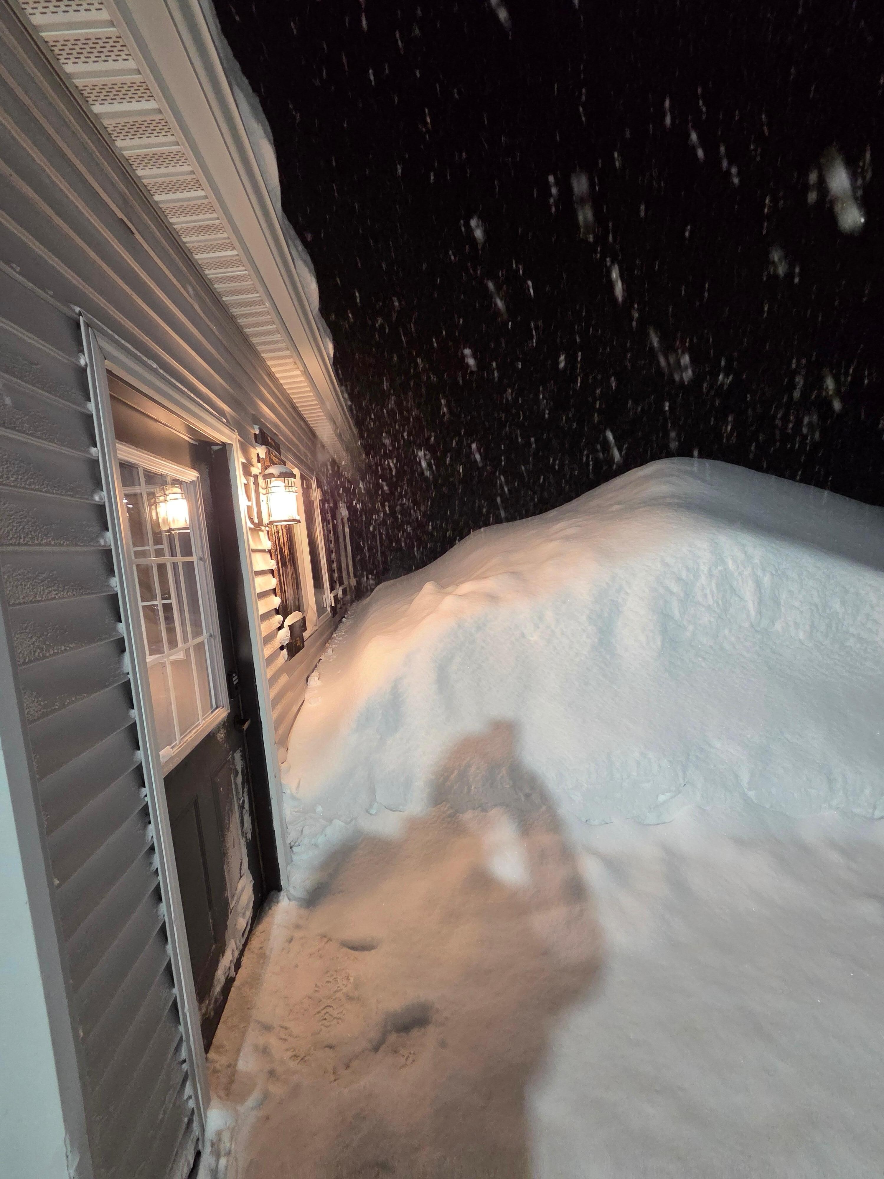 Snow piles over your head.