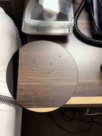 Dried glue on the nightstand (which was also almost falling off the wall and a broken handle placed in the drawer itself