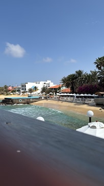 The view from the main restaurant to the beach restaurant and swimming poil