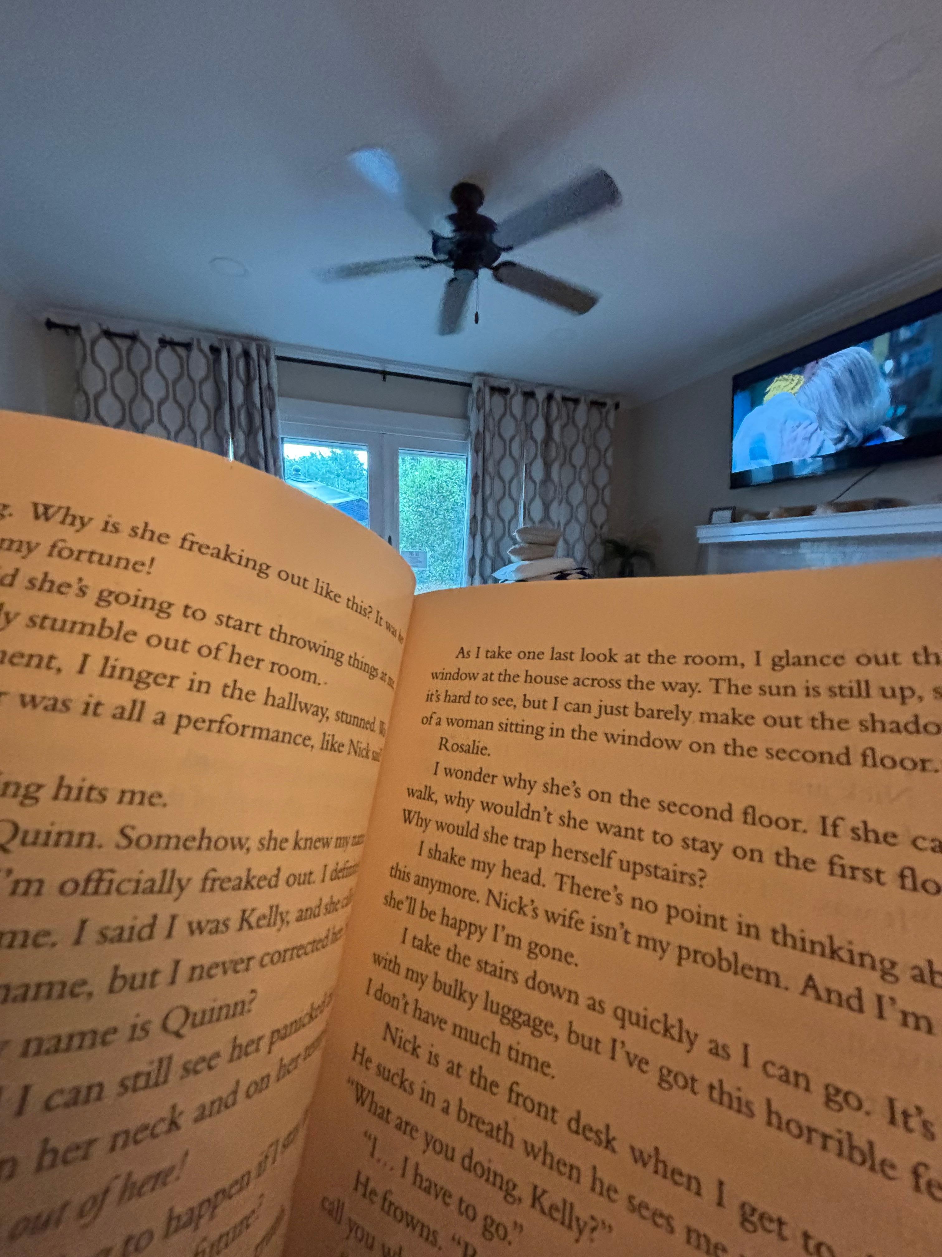 A book in the living room on a rainy day. 