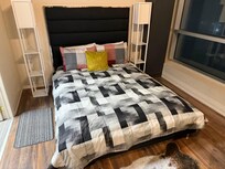 You can see the CN Tower from your bed.