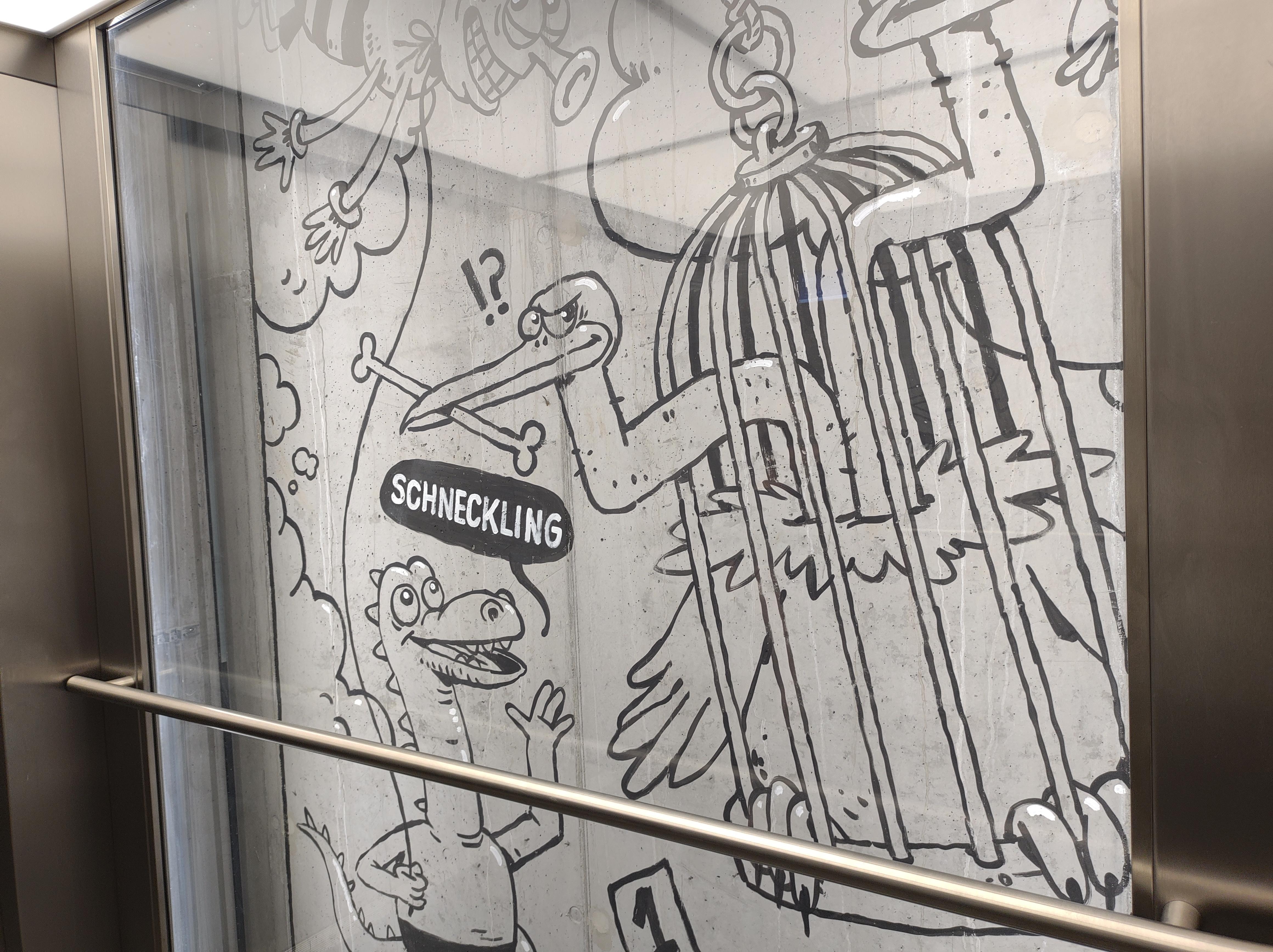 Tegneserie i elevatoren