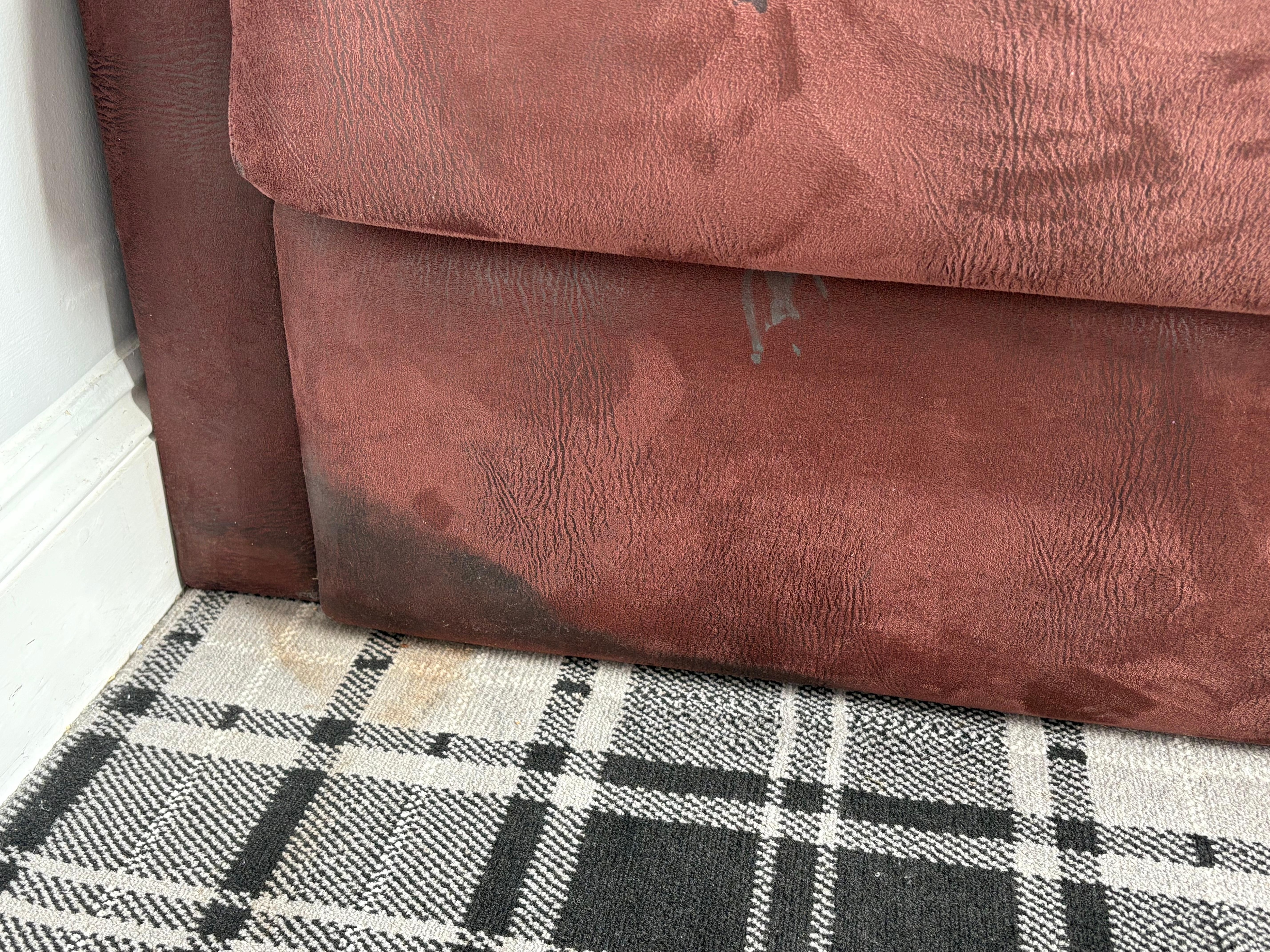 Stained carpet and sofa.