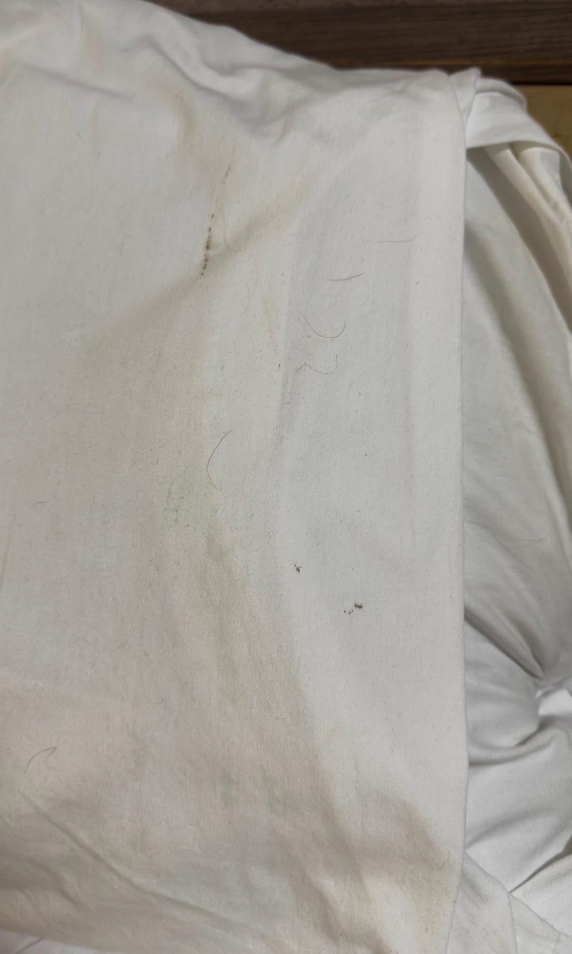 Dirty pillows with hair and blood