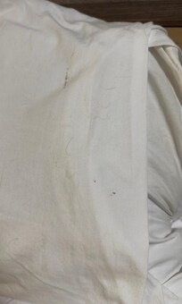 Dirty pillows with hair and blood
