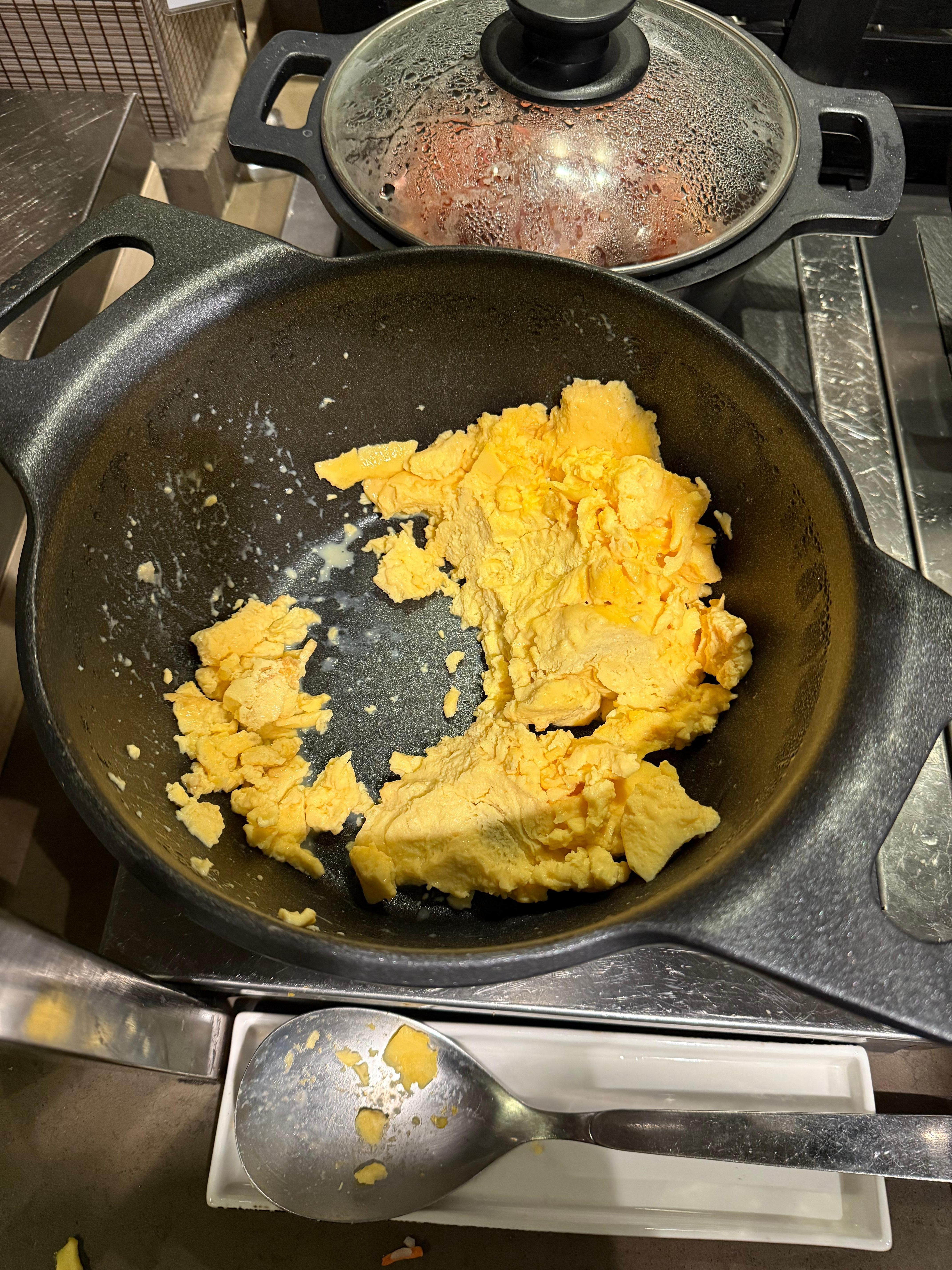 Very cold and hard scrambled eggs at breakfast