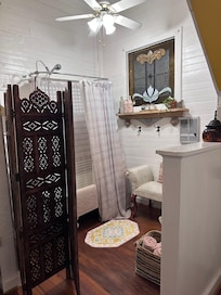 The bathroom was lovely if a tad cramped. The tub had some chipping on the enamel and was slow draining.