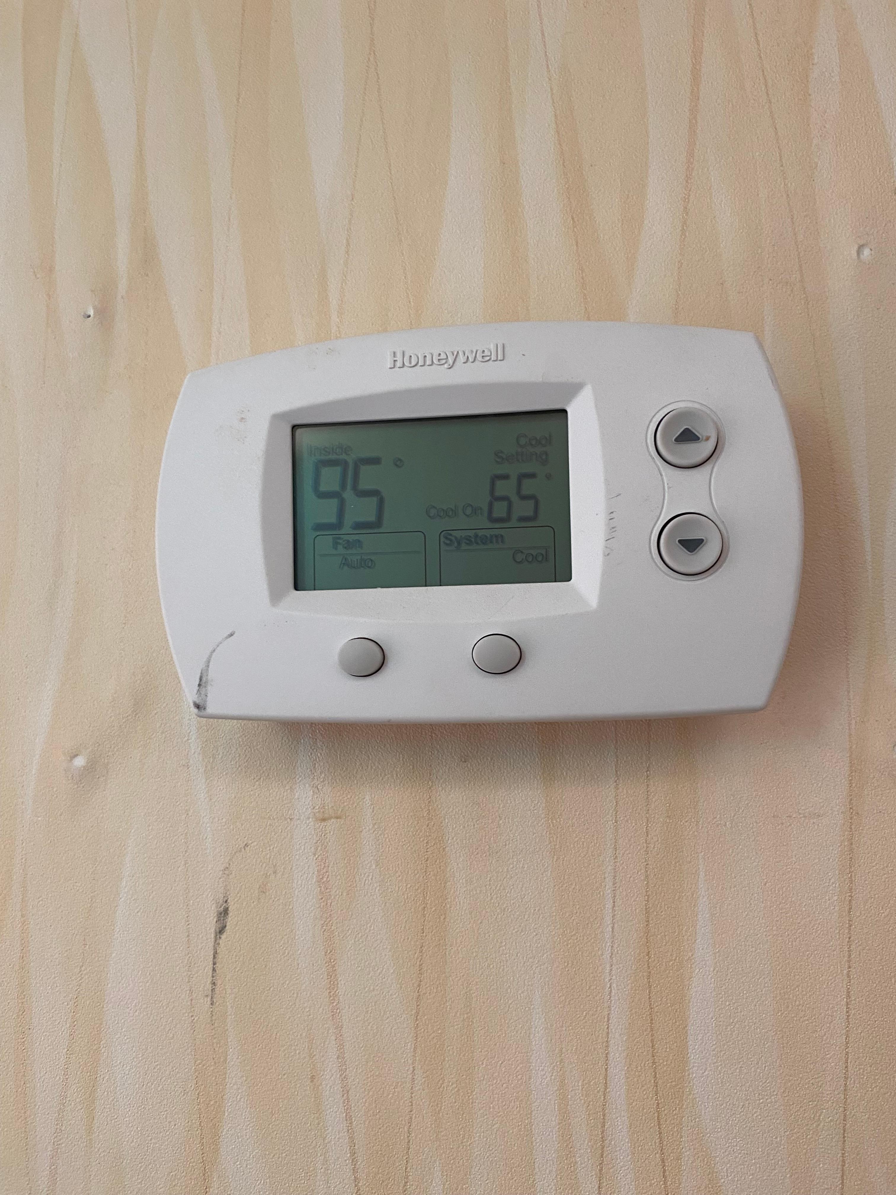Thermostat outside our room