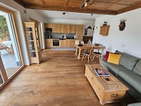 Living and kitchen. Couch pulls out