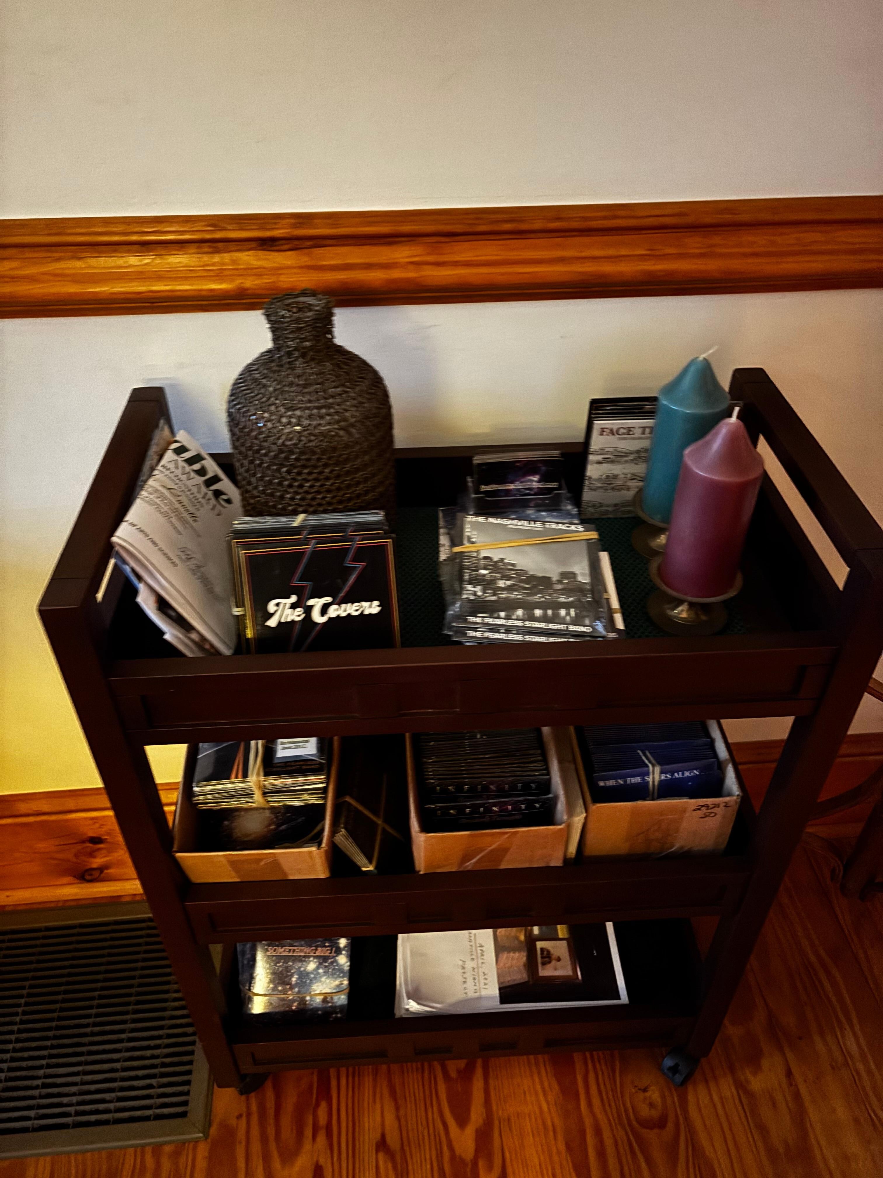 Small table in hallway-not our stuff. 