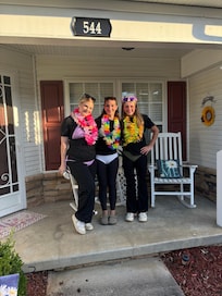 On the front porch of the Townhouse.