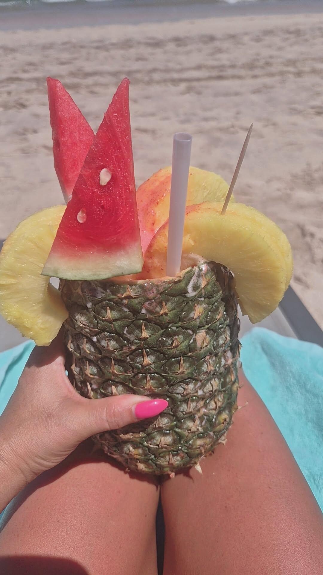 People walk the beach offering all sorts of things. I got this delicious drink!