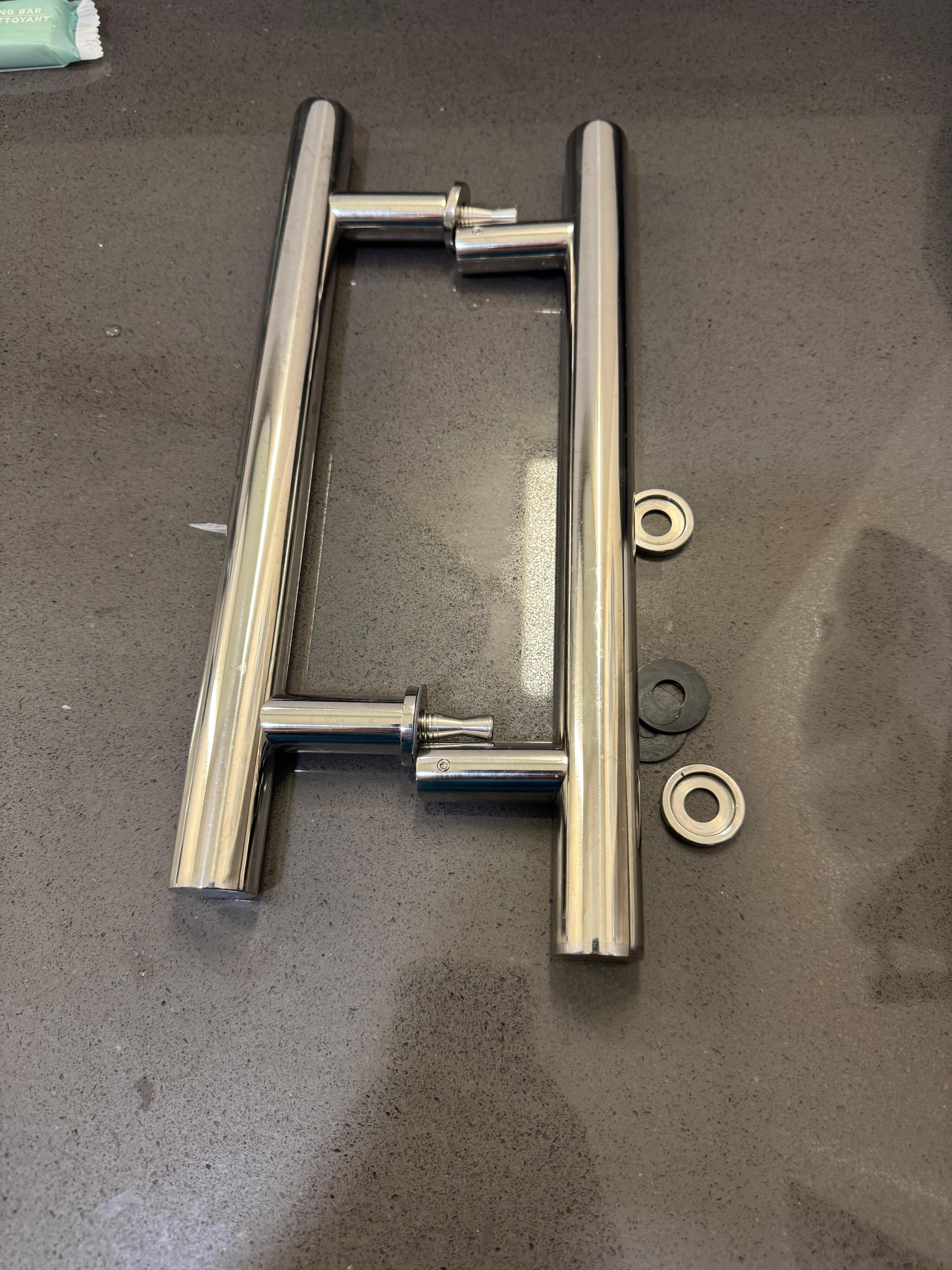 The fallen shower door handle