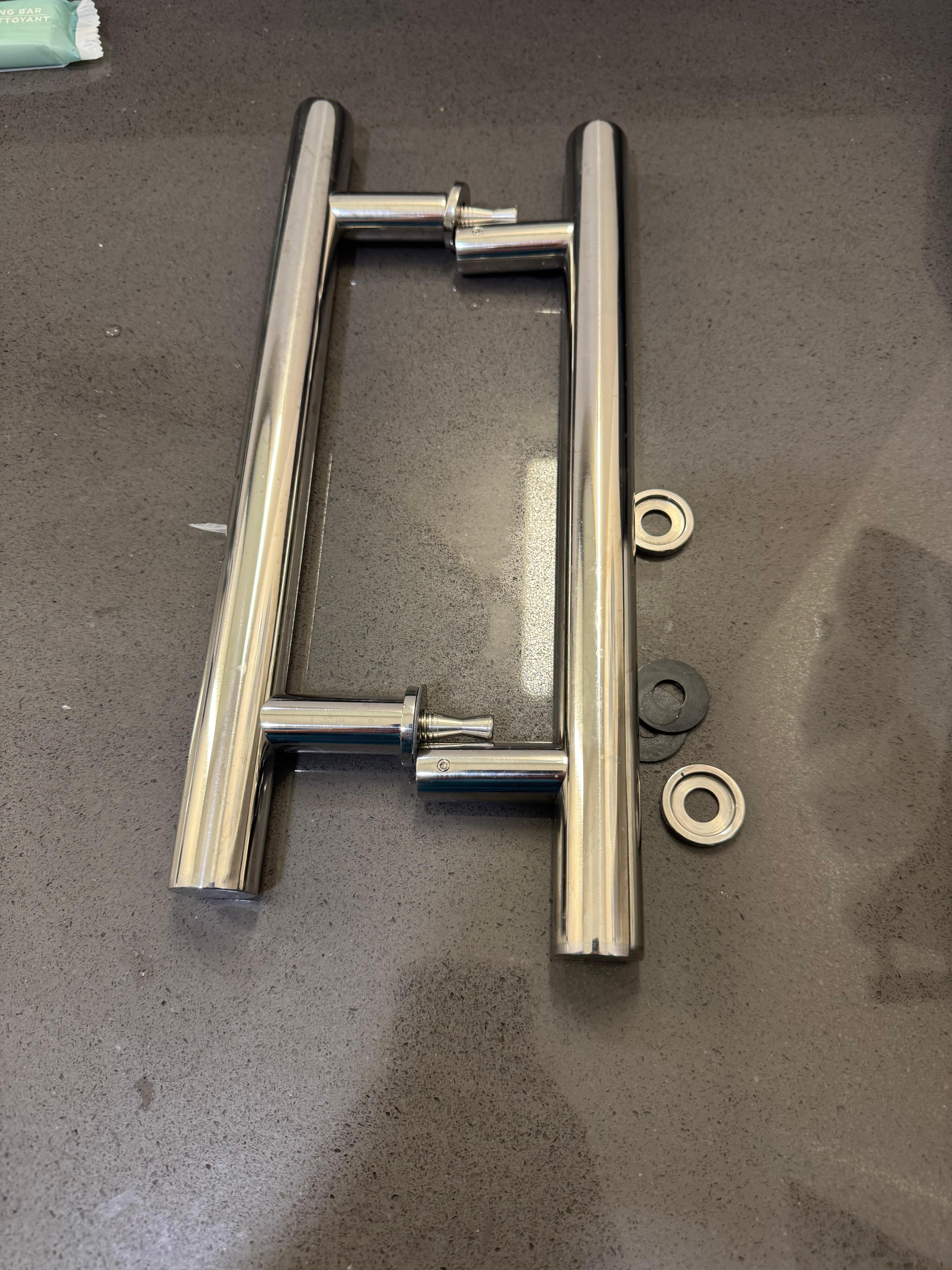 The fallen shower door handle
