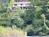 View of the home from across the river
