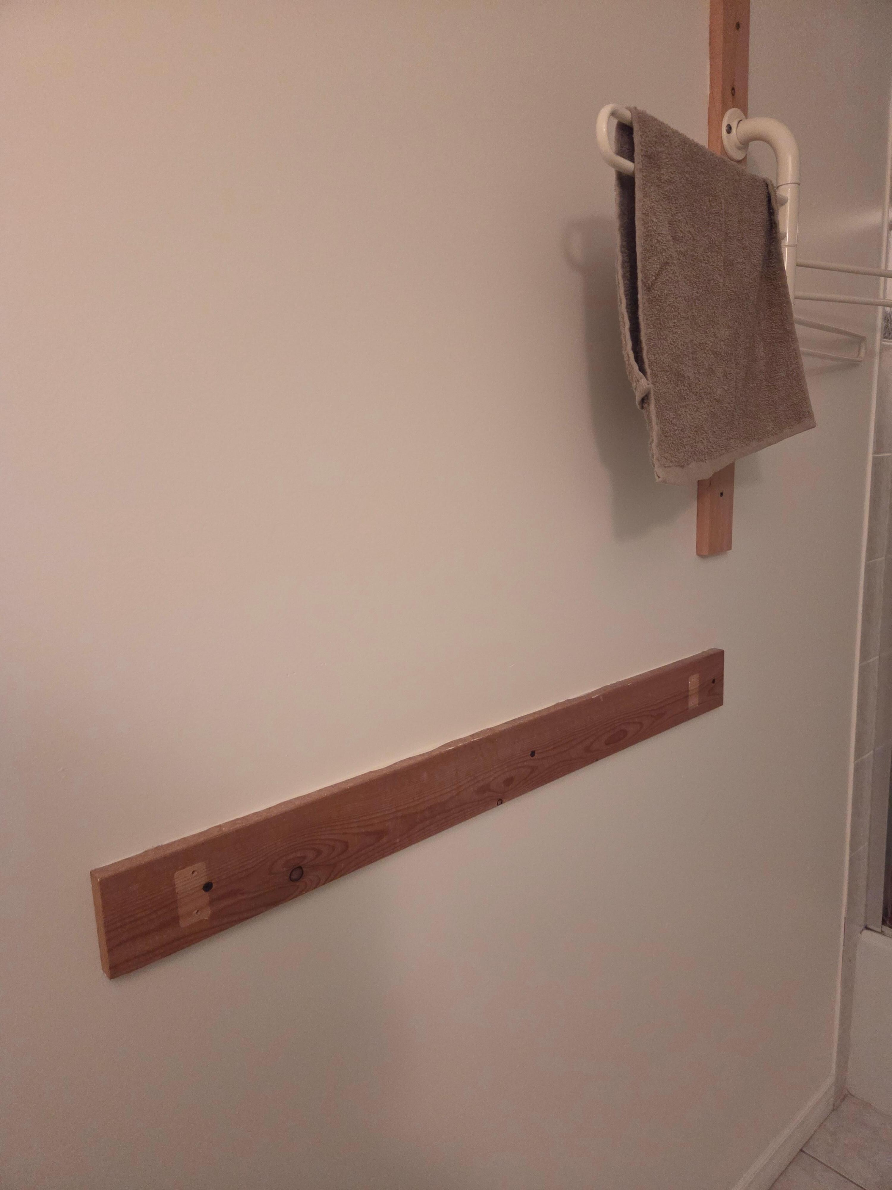 No towel rack, possible used hand towel