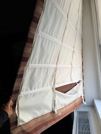 Torn and broken shade