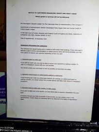 the note attached in the main door explaining how customers will get refund
