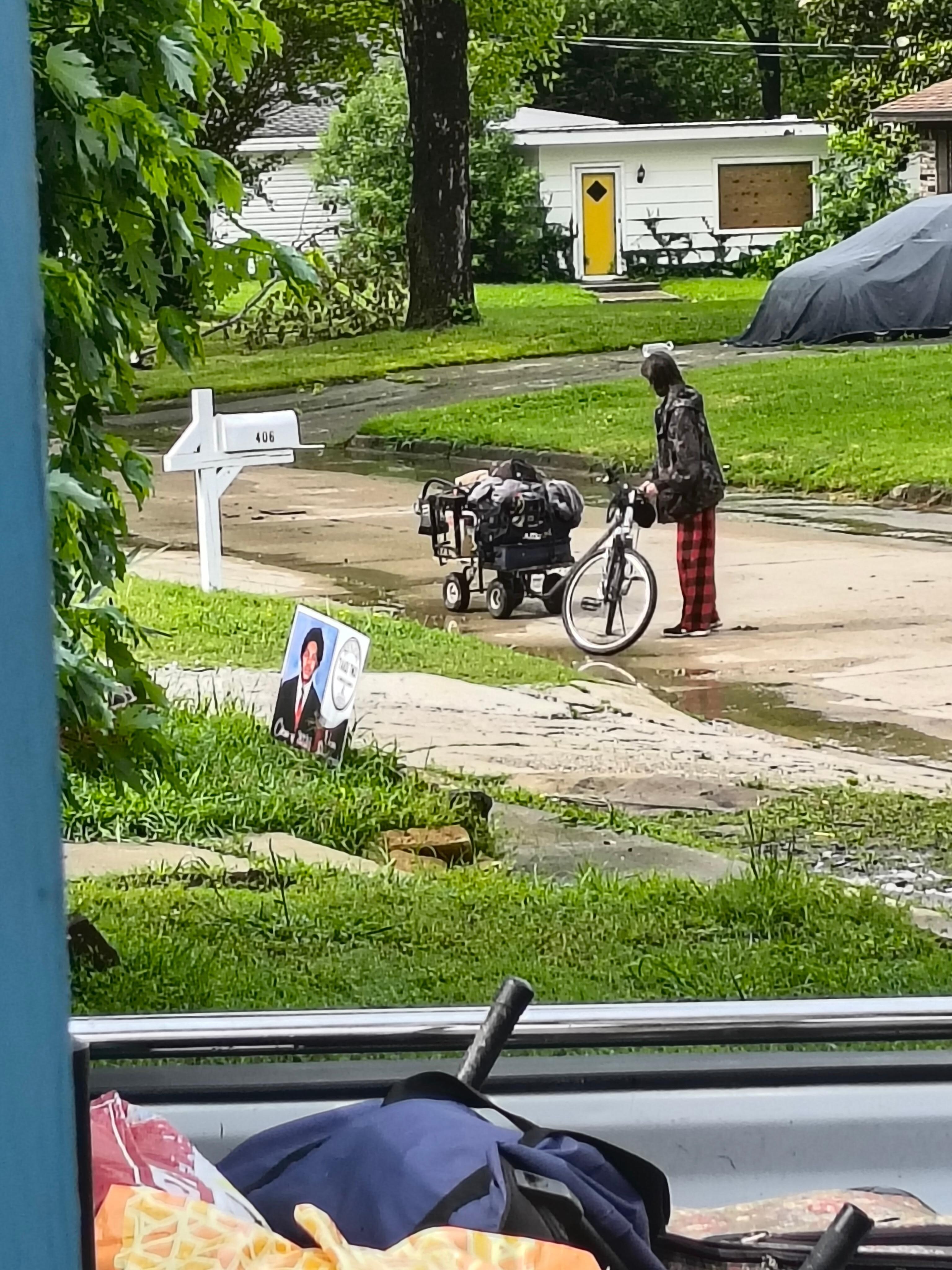 Homeless people outside hanging out 
