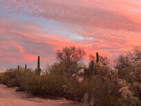 View of sunset from end of driveway