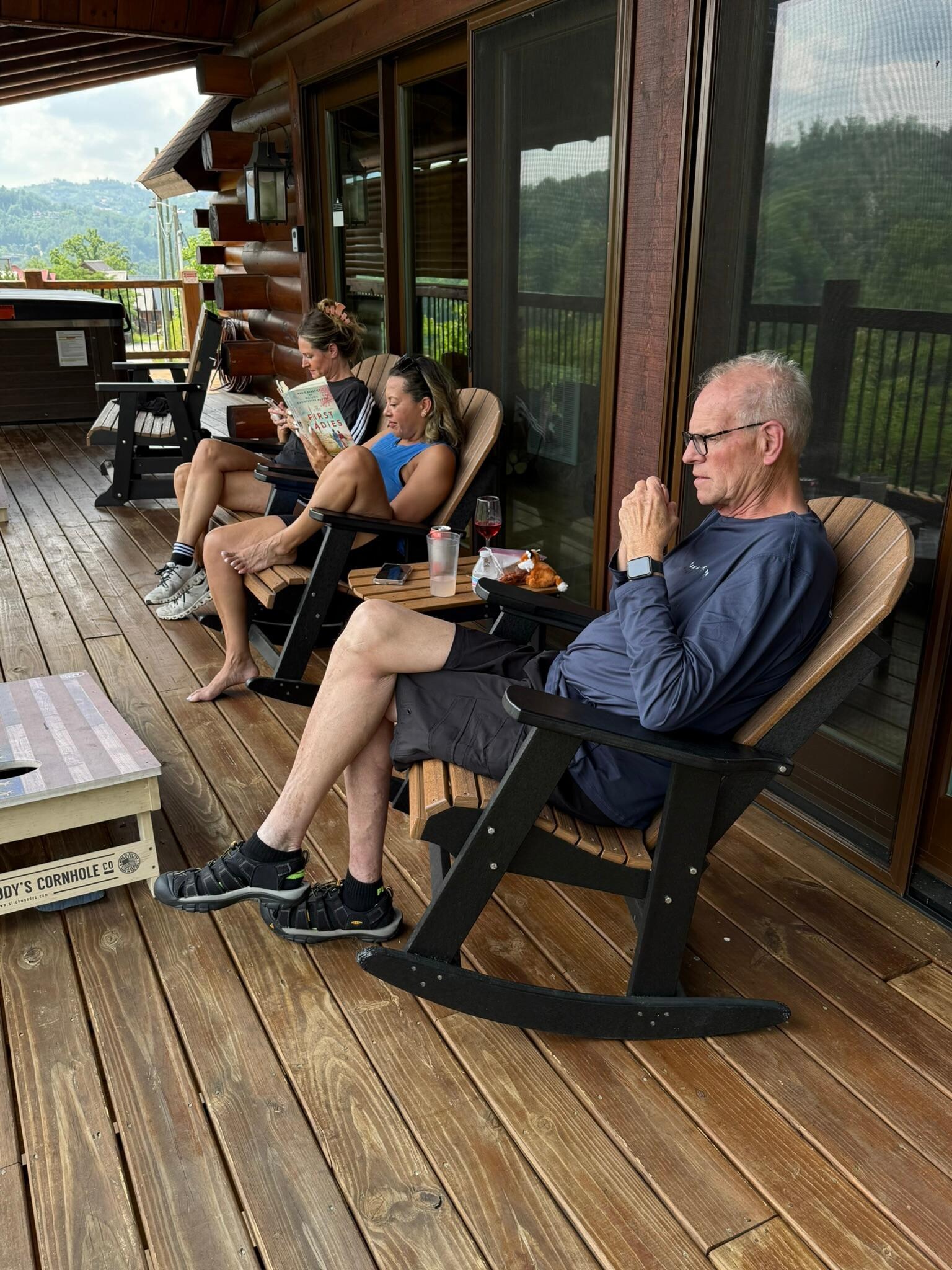 Dennis and two of our daughters relaxing on the deck.