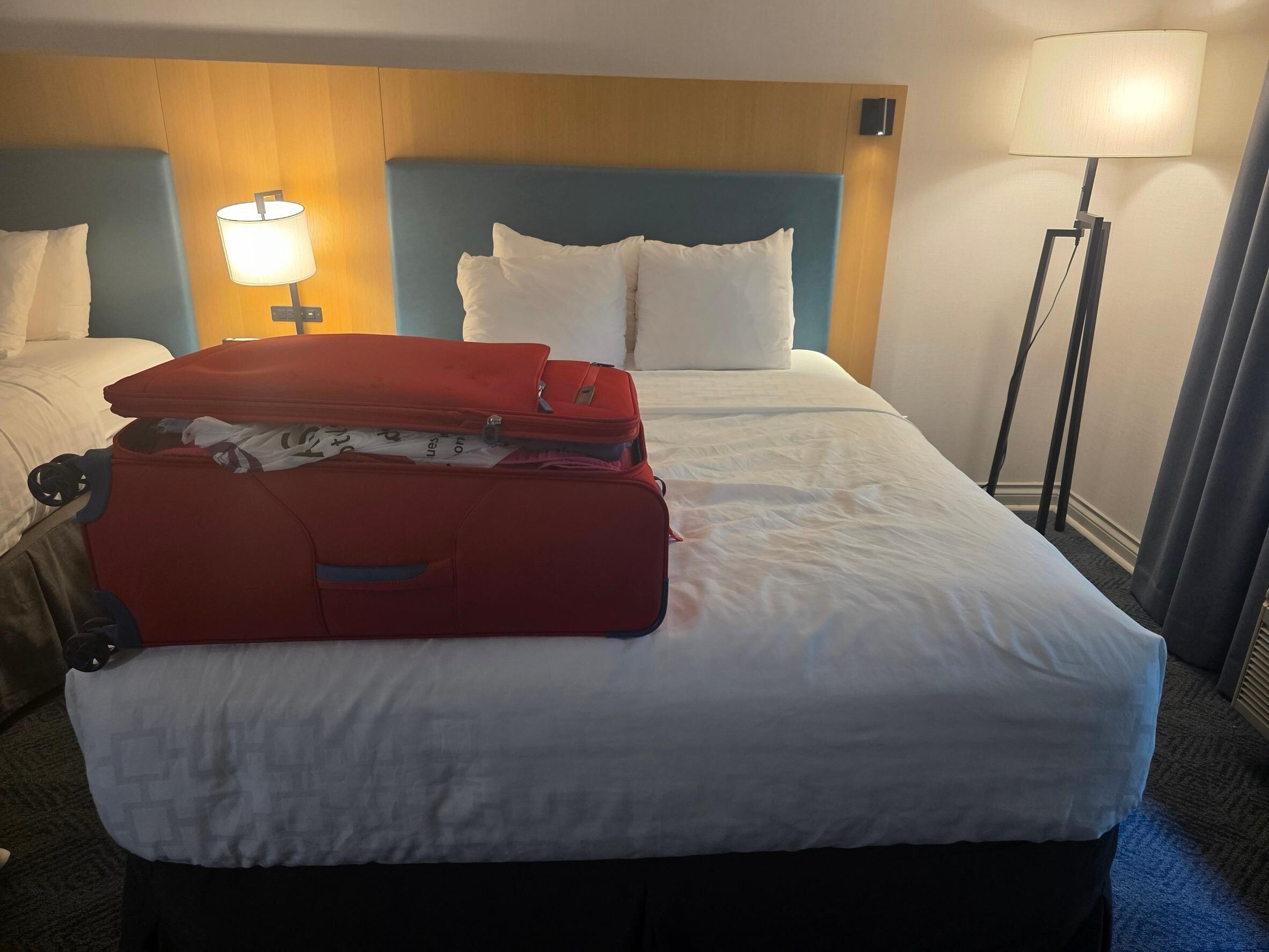 Full size luggage (65cm height) compare to the bed showing this bed is clearly 130 cm width. which is double size