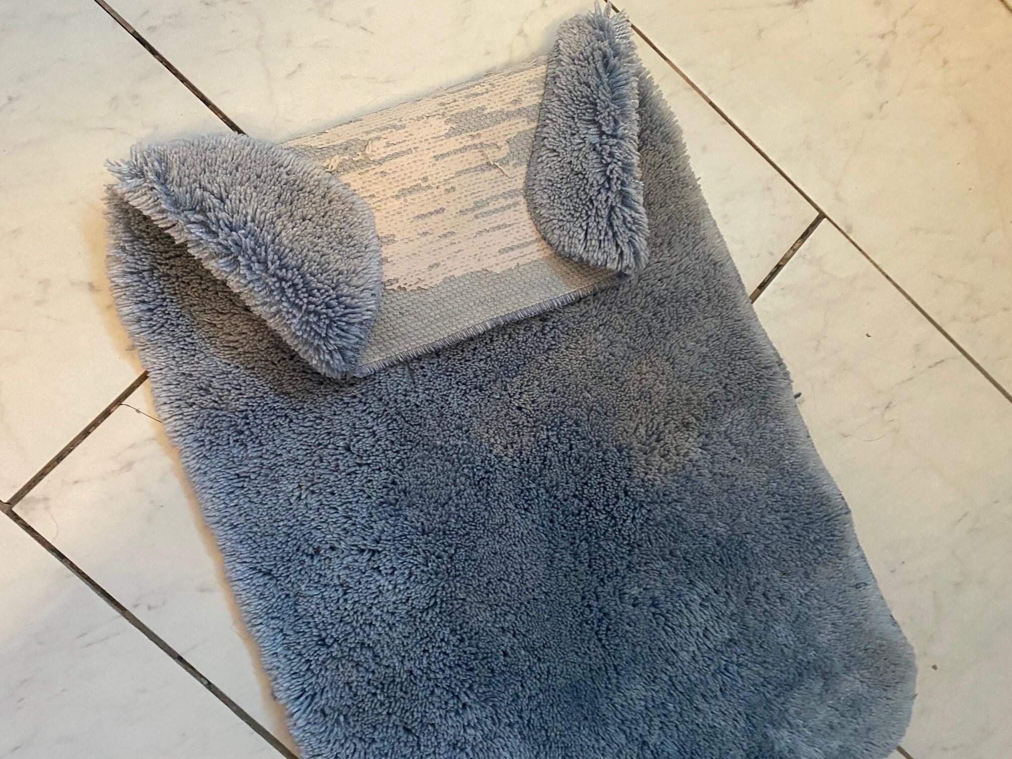 Bath mat stained and nasty