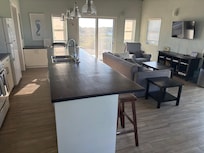 A spacious kitchen, living, and dining room area!