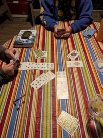 Cards on the screened-in porch