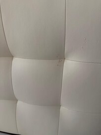 Idk what this is splattered all over headboard and lamp