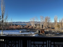 Daytime view from the balcony overlooking the lake.
