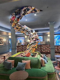 Book tower sculpture by reception