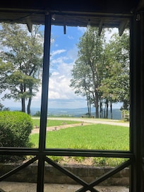 Screened porch view. No reason to leave the property to enjoy the mountain and outdoors!