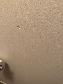 Dents in wall