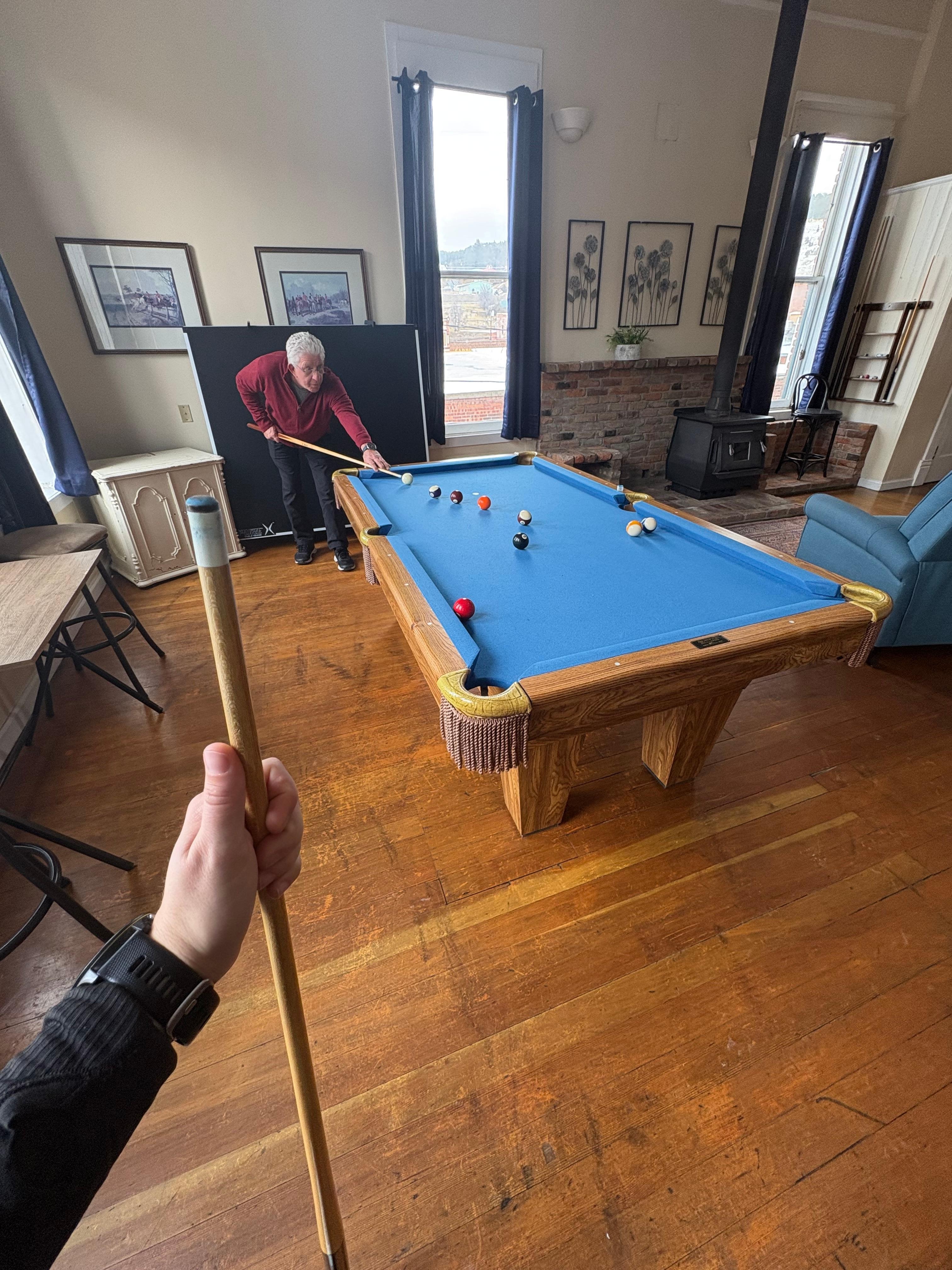 Lots of competition  on the pool table