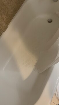 Leaking faucet/dirty tub