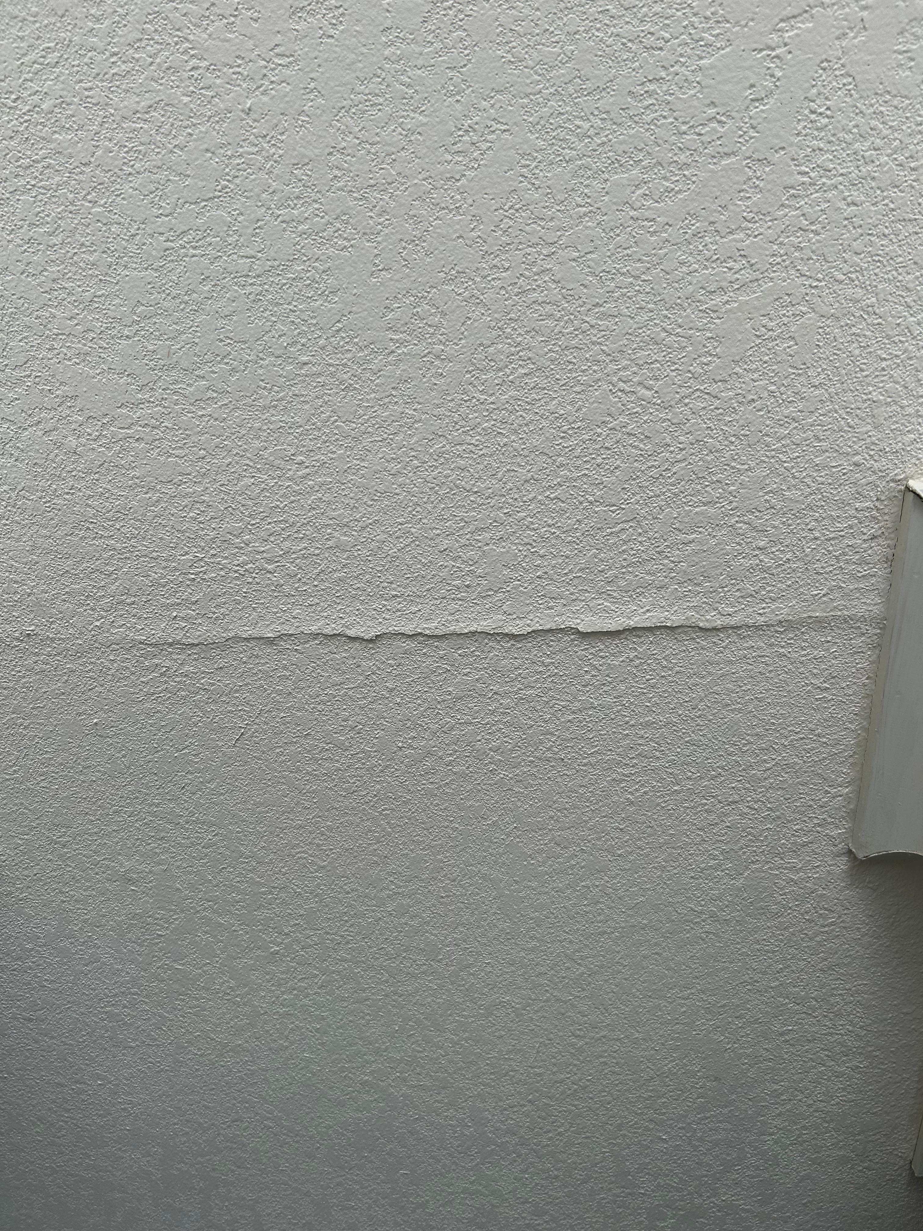 Holes in wall paint.