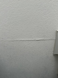 Holes in wall paint.