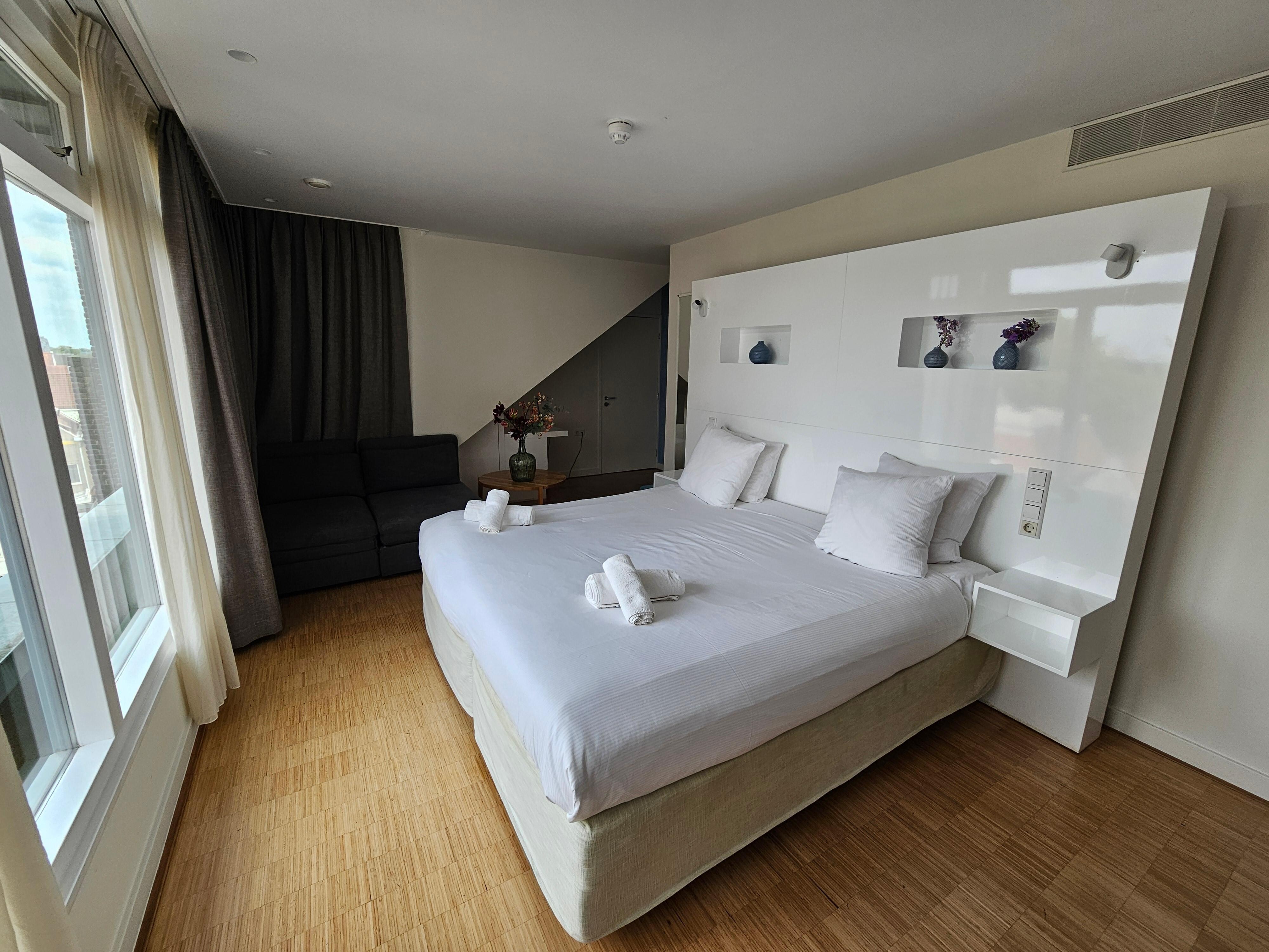 A spacious room with a comfortable king.