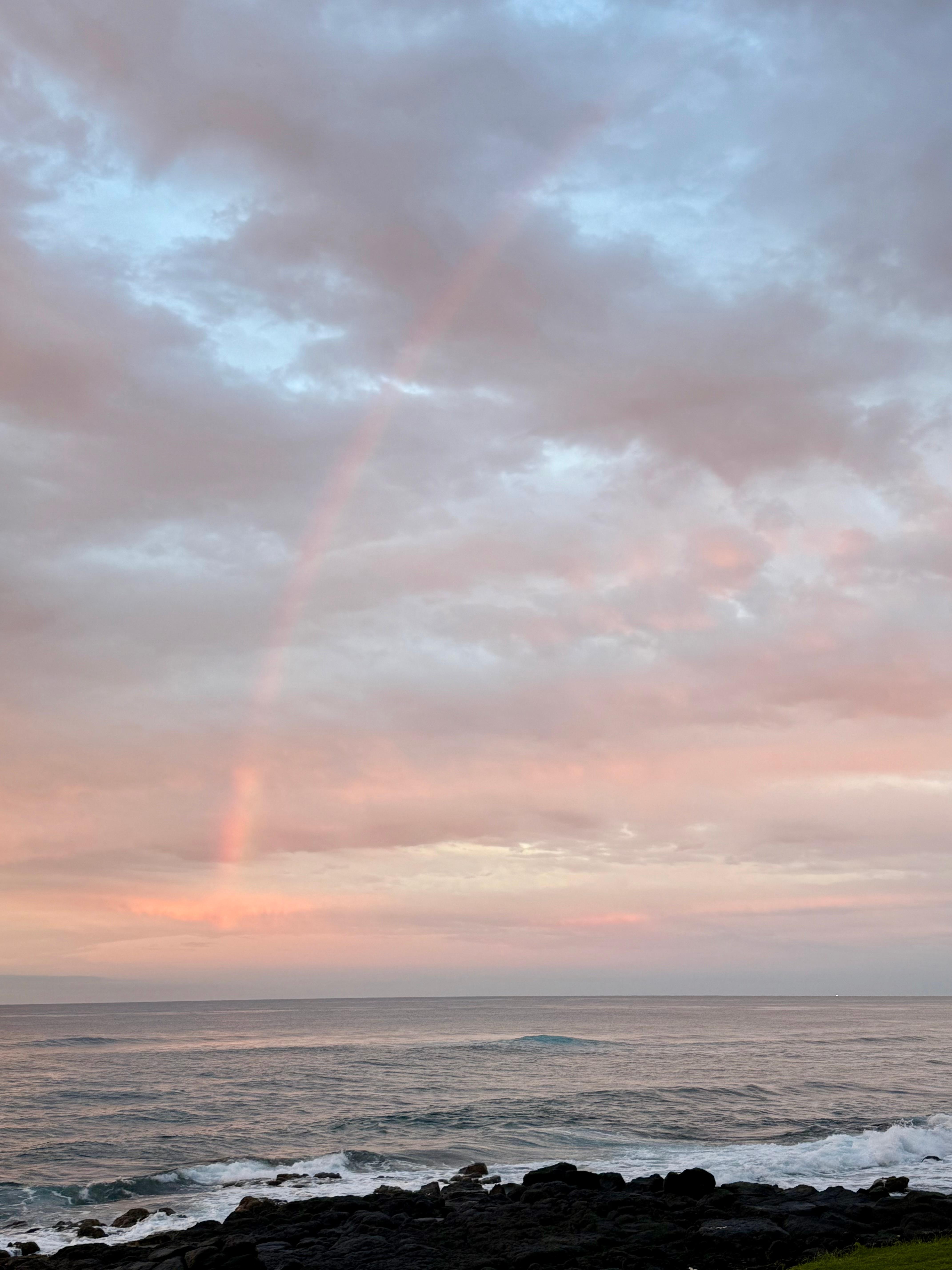 Sunrise with rainbow from Lanai